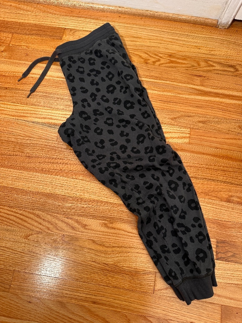 gray and black cheetah print joggers